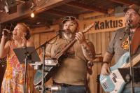 Rebecca, Stoney and Mark on stage singing