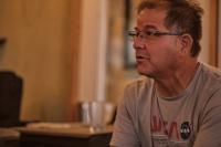 James sitting at a table